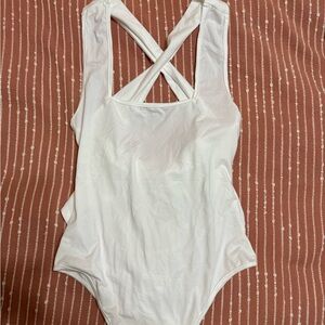 White cross cross body suit